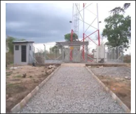 Completed compound with shelter and mast